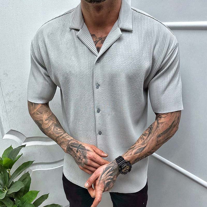 Camisa de manga corta de color sólido para hombre