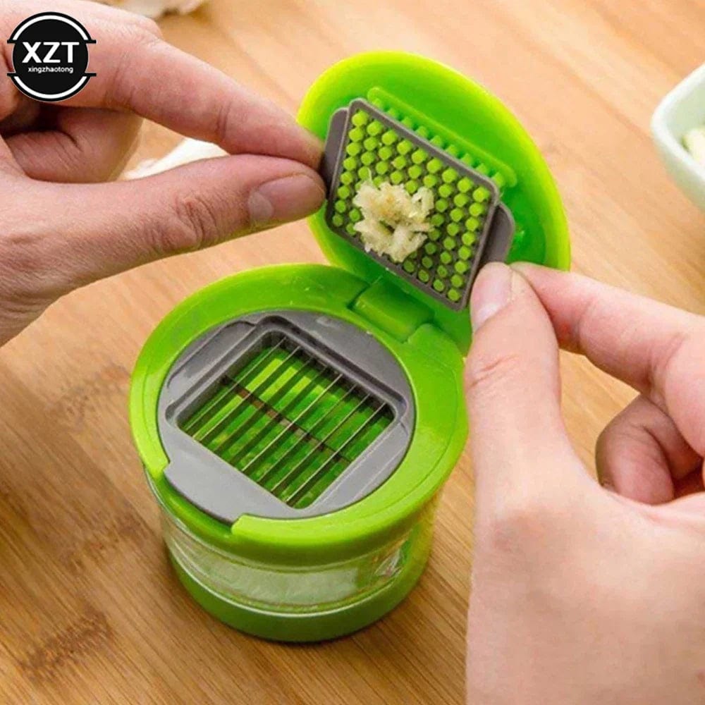 1pcs Kitchen Vegetable Tools Mini Garlic Press Presser Onion Chopper Garlic Mincer Slicer Dicer Grater Kitchen supplies Gadgets Xpress